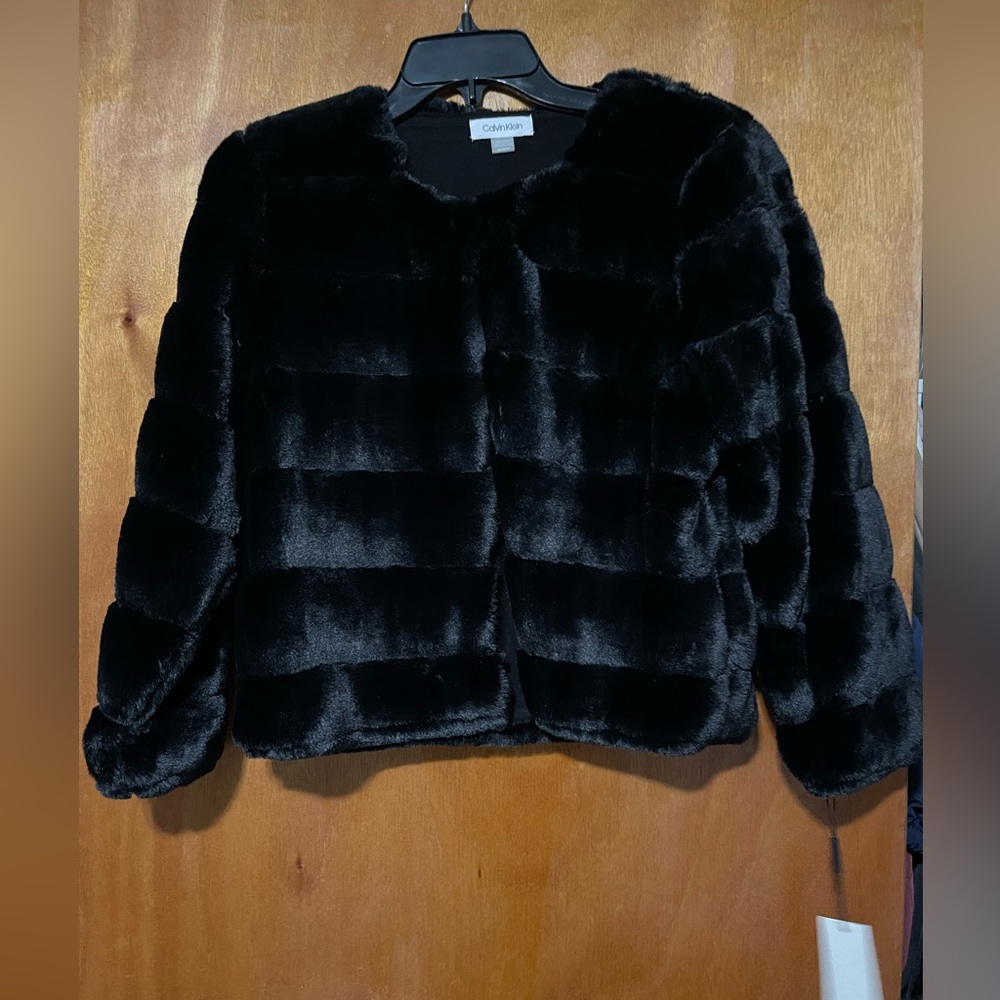 Calvin Klein, Medium fur coat. Brand new with tags.